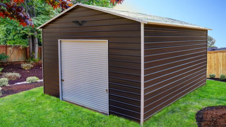 18x25x12 boxed eave roof metal garage with brown siding and a roll-up door, placed on a green lawn with landscaping. This tall metal garage offers secure vehicle and equipment storage, and Eagle Carports provides metal garages for sale to protect your property year-round.