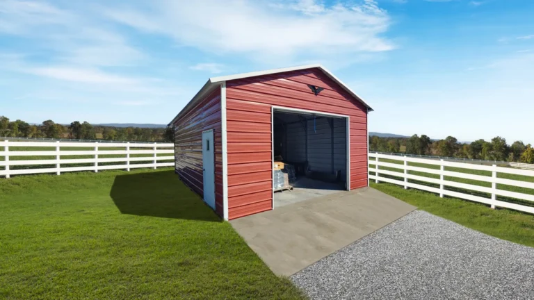18x25x9 boxed eave roof metal garage with red siding, roll-up door, and side entry door on a farm property with white fencing. This spacious metal garage offers secure storage for vehicles and equipment, and Eagle Carports provides metal garages for sale to protect your investments.